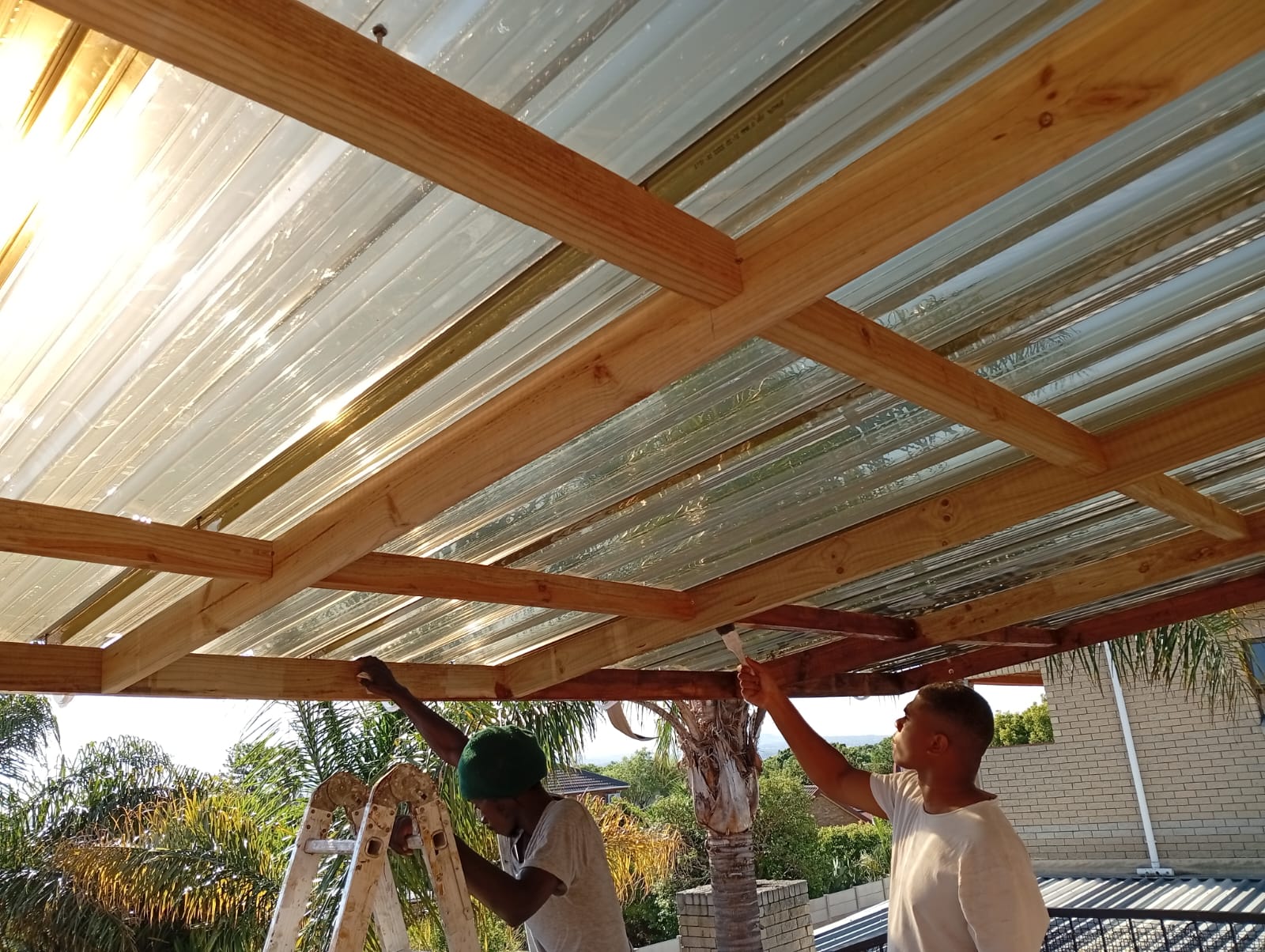 Eco Projects team completing a timber carport roof in Cape Town