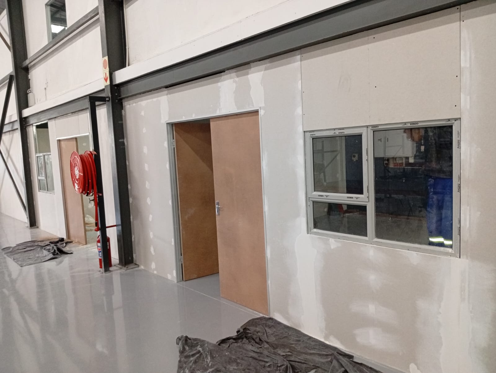 Commercial drywall partition and windows installed by Eco Projects